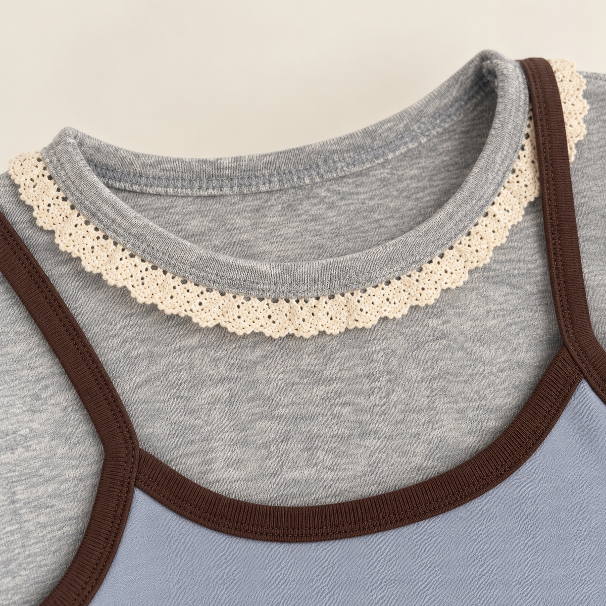 Blue cat bow top neckline detail.