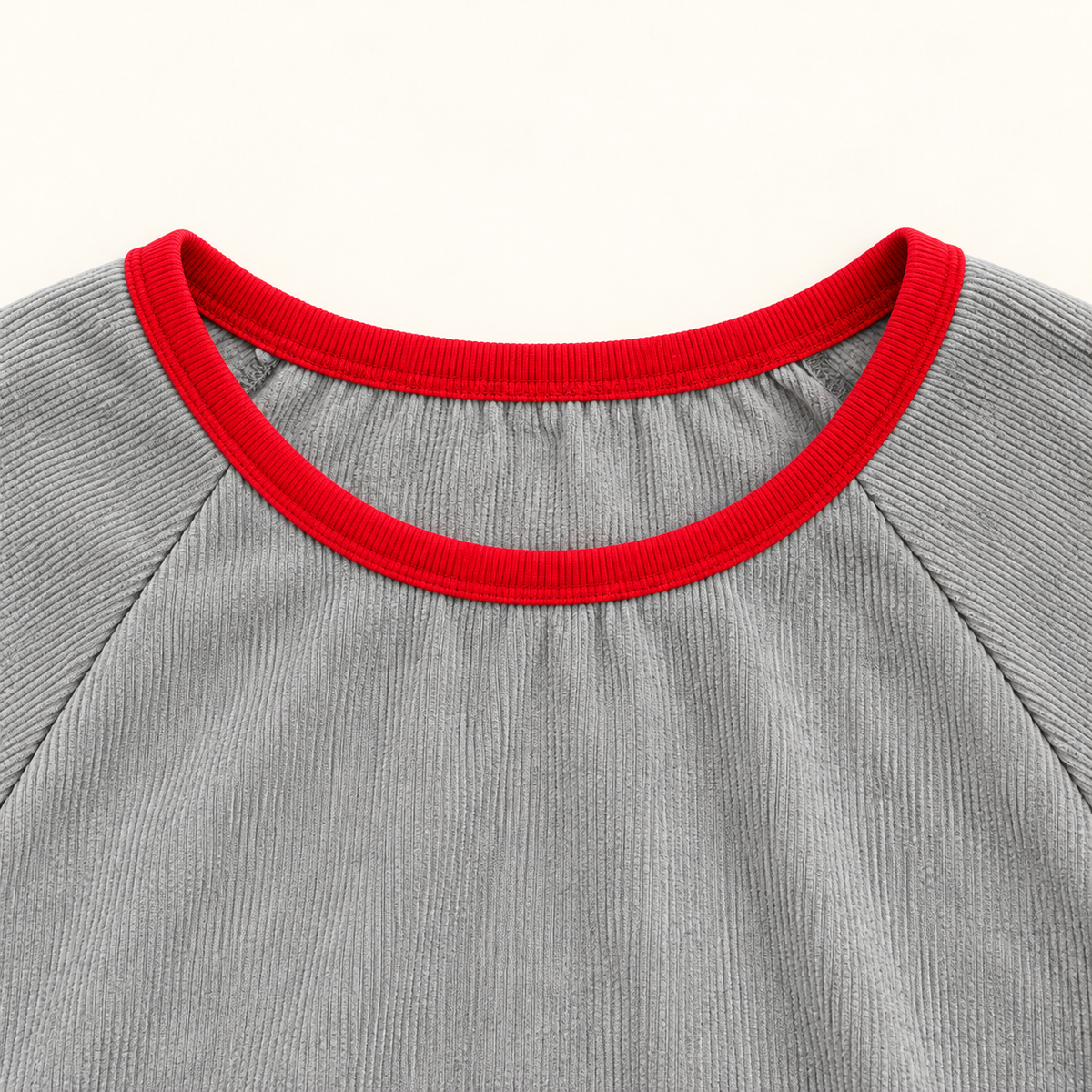 Grey contrast trim top red neckline and raglan seam detail.