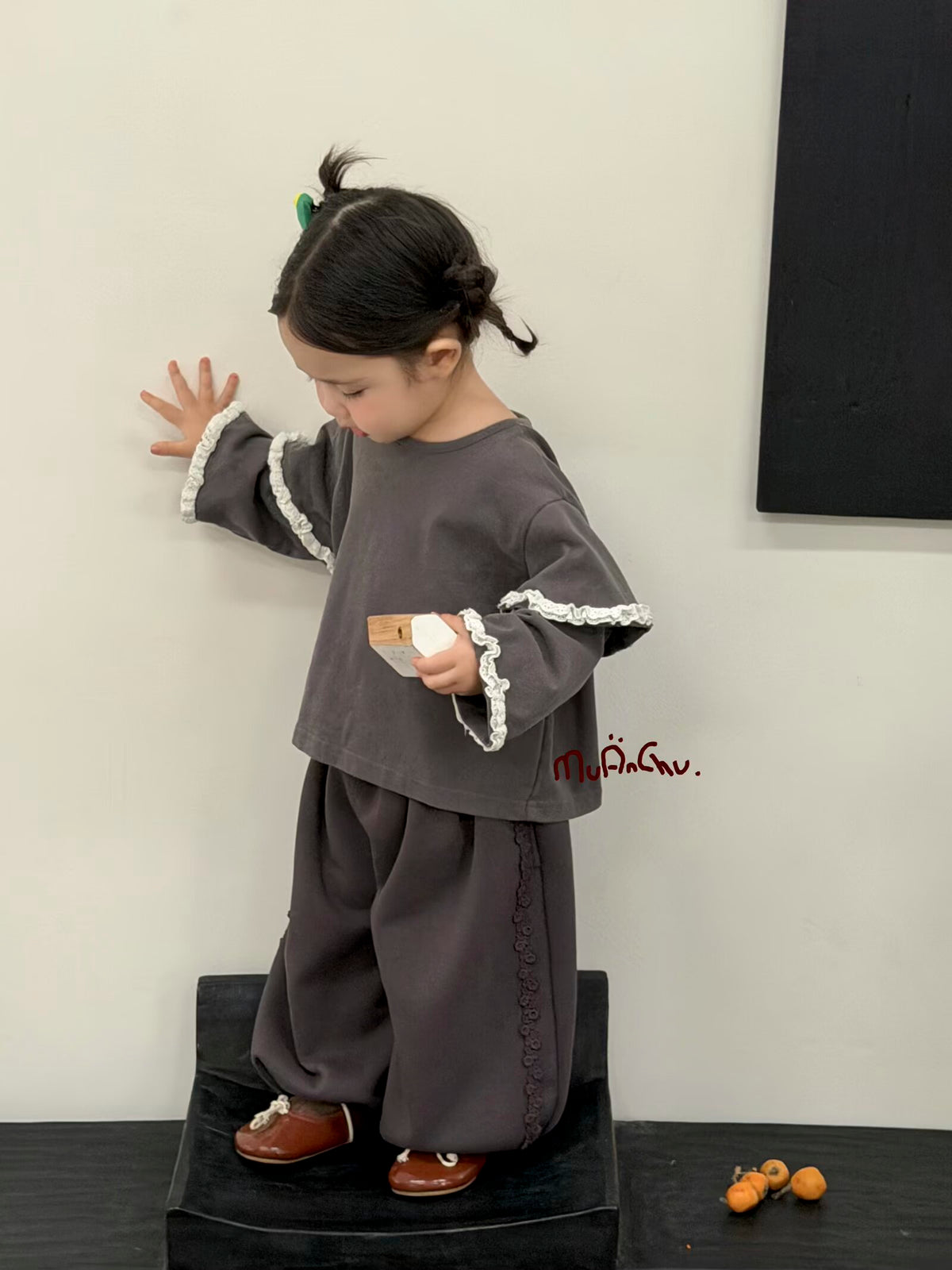 Original styling photo for children's top 8040; accessories and other garments shown for styling.