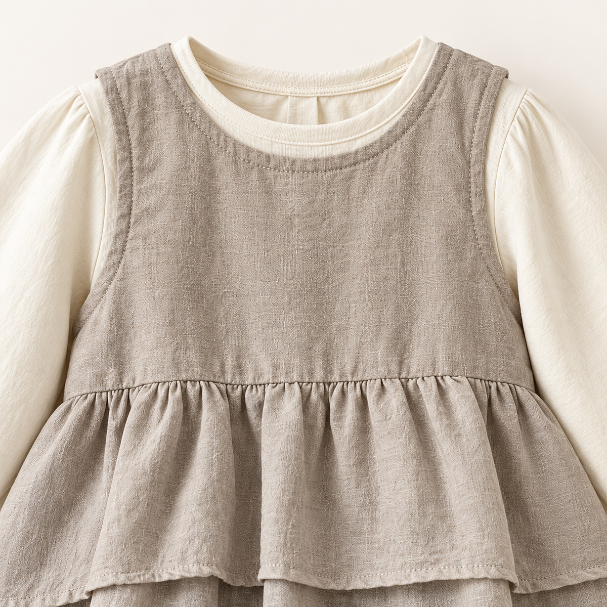Taupe layered dress and ivory top set, neckline detail.